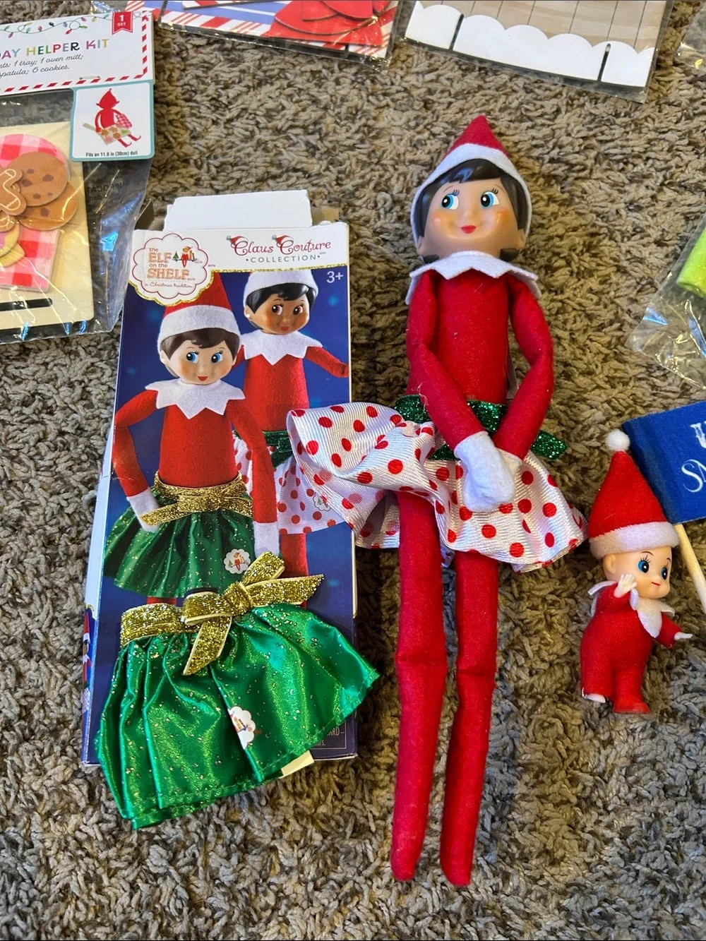 Elf on the shelf, elf figure, baby elf, and lots of props and accessories